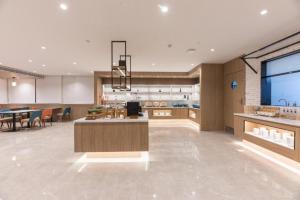 A cozinha ou cozinha compacta de Hanting Hotel Wuhu Nanling County