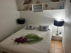 Кровать или кровати в номере Kouliwou