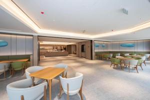 Lounge nebo bar v ubytování Ji Hotel Yantai Guanhai Road Fisherman's Wharf