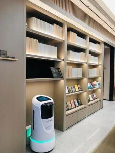a room with a toaster in the middle of a store at Ji Hotel Yantai Wanda Plaza Huanshan Road in Yantai