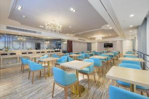 Restaurant ou autre lieu de restauration dans l'établissement Starway Hotel Nanning Jianzheng Road
