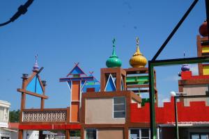 a building with colorful domes on top of it at Sunset Curly Bay Hotel & Resort in Tanjung Pinang 