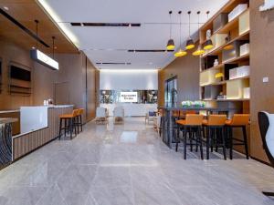Μια τηλεόραση ή/και κέντρο ψυχαγωγίας στο Echarm Hotel Wuhan Keting Polar Ocean World