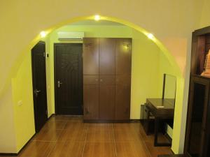 an archway in a room with a closet and a desk at Shanhai-Blues in Odesa +58 photos