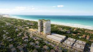 an aerial view of a building next to the beach at Victor Group - Sam Sam Phu Yen Condotel in Phước Hậu