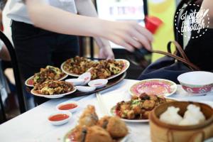 a table topped with plates of food and bowls of food at Cozy Private Single Room in Carramar - Nearby Station & Shops - Shared Bathroom in Sydney