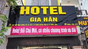 a sign for a hotel ga man on a building at Gia Hân Hotel Bình Tân in Ho Chi Minh City