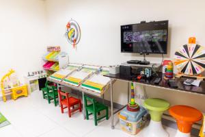 Una televisión o centro de entretenimiento en 宜家莊親子民宿