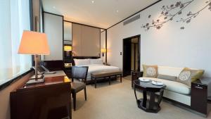 Letto o letti in una camera di The Peninsula Hong Kong
