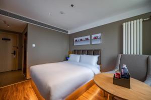 Voodi või voodid majutusasutuse True Go Hotel - Beijing Asian Games Village National Convention Center toas