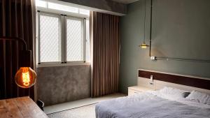 Cama o camas de una habitación en 泊寓 BOYU Hotel