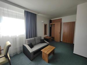 Posedenie v ubytovaní Hotel P7