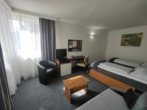 Posteľ alebo postele v izbe v ubytovaní Hotel P7