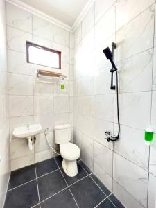 Vannituba majutusasutuses Ayuri Hotel Malioboro