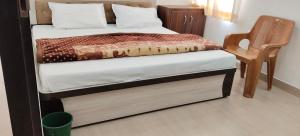 Postel nebo postele na pokoji v ubytování Hotel Manasvi Palace