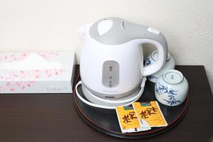 Příslušenství pro přípravu čaje a kávy v ubytování Sapporo Oriental Hotel