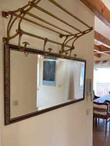 a large mirror on a wall in a room at Burgblick Pünderich in Pünderich