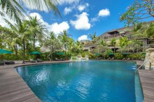 Bazén v ubytování Legian Beach Hotel nebo v jeho okolí