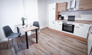Η κουζίνα ή μικρή κουζίνα στο großzügige Altstadtwohnung Lara für 6 Personen +7 φωτογραφίες
