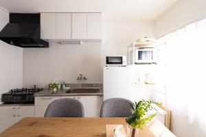 Cucina o angolo cottura di Lino下伊福 岡山駅車で5分 無料駐車場 レストラン徒歩圏内多数