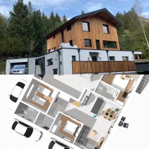 uma representação de uma casa com telhado em Waldblick - modern wohnen - Self-Check-In - direkt am Wald - kein Verkehr - in 10 Minuten im Innsbrucker Zentrum - vorm Haus parken em Innsbruck