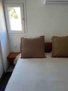 מיטה או מיטות בחדר ב-Ti coin sauvage - 4 pers avec Jacuzzi/St-Philippe