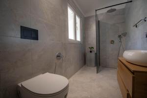 Koupelna v ubytování Apartments Betty Borik + 43 fotografií