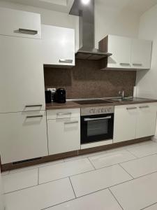 Η κουζίνα ή μικρή κουζίνα στο Schöne Wohnung mit Balkon