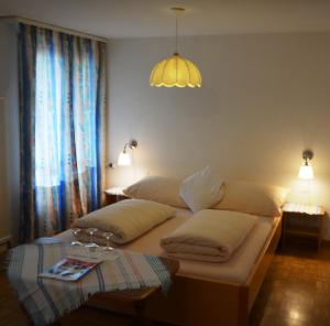 Postel nebo postele na pokoji v ubytování Bed and Breakfast Krone