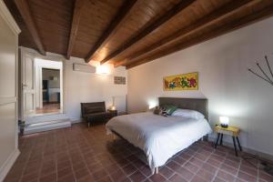 Posteľ alebo postele v izbe v ubytovaní Sui tetti di Trani Harbour suite