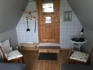 Posezení v ubytování B&B Hannåsa Gård