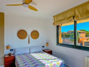 En eller flere senge i et værelse på Vivalidays Villa Amatista + 36 billeder