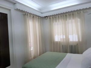 Posteľ alebo postele v izbe v ubytovaní Avres Apartments