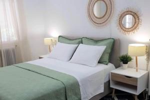 Posteľ alebo postele v izbe v ubytovaní Avres Apartments