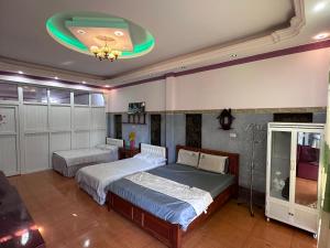 Postel nebo postele na pokoji v ubytování Homestay Mộc Nguyên