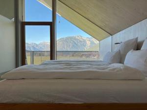 Voodi või voodid majutusasutuse TIROLER TRIS Full House 10 beds toas