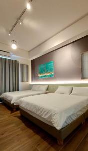 Una cama o camas en una habitación de Mi Hai B&B