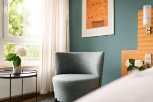 Postel nebo postele na pokoji v ubytování Hotel Hiller in Abstatt