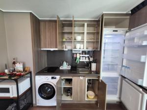A kitchen or kitchenette at ELBON the stay Haeundae beach ocean view