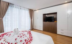 Postel nebo postele na pokoji v ubytování Silana Beachfront Hotel & Spa