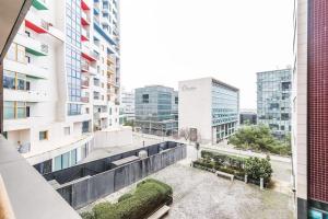 a view from the balcony of a building at Vita Portucale ! Expo Deluxe with Terrace in Lisbon