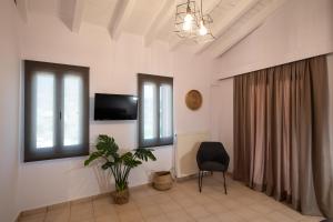 TV a/nebo společenská místnost v ubytování Drakatos Apartments