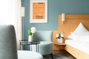 Postel nebo postele na pokoji v ubytování Hotel Hiller in Abstatt