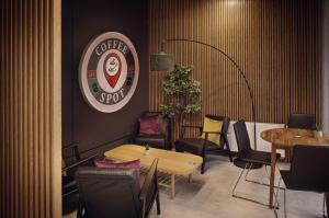 Posezení v ubytování Laurentroom Hotel