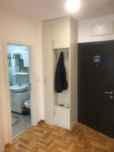 Vannituba majutusasutuses Apartman Stojanovic R
