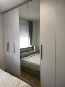 Voodi või voodid majutusasutuse Apartman Stojanovic R toas