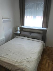 Voodi või voodid majutusasutuse Apartman Stojanovic R toas