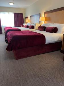 Katil atau katil-katil dalam bilik di Headfort Arms Hotel
