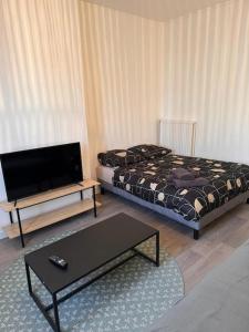 Ein Bett oder Betten in einem Zimmer der Unterkunft L'Eco Studio
