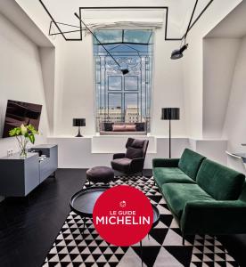 Televízia a/alebo spoločenská miestnosť v ubytovaní Hotel Indigo Warsaw Nowy Świat by IHG